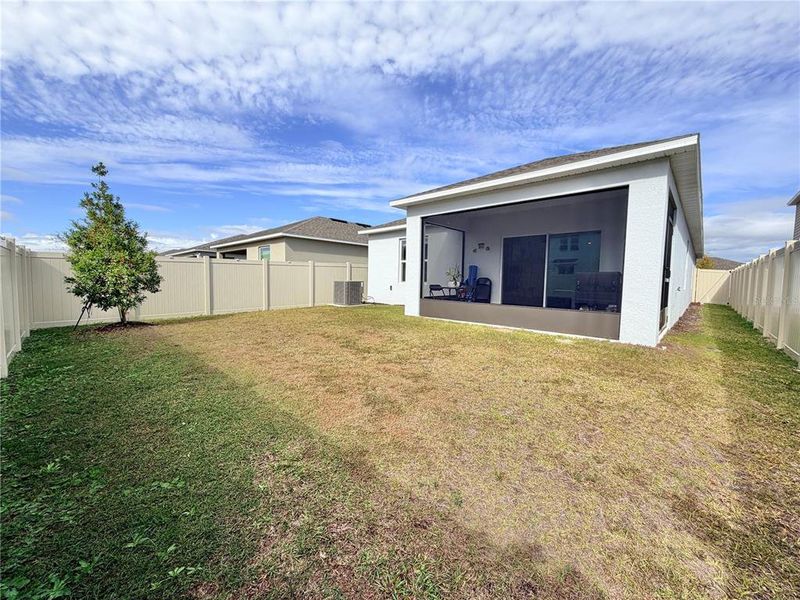 Exterior details and patio area of a home in Westview Community Group Page, Kissimmee (Image 24).
