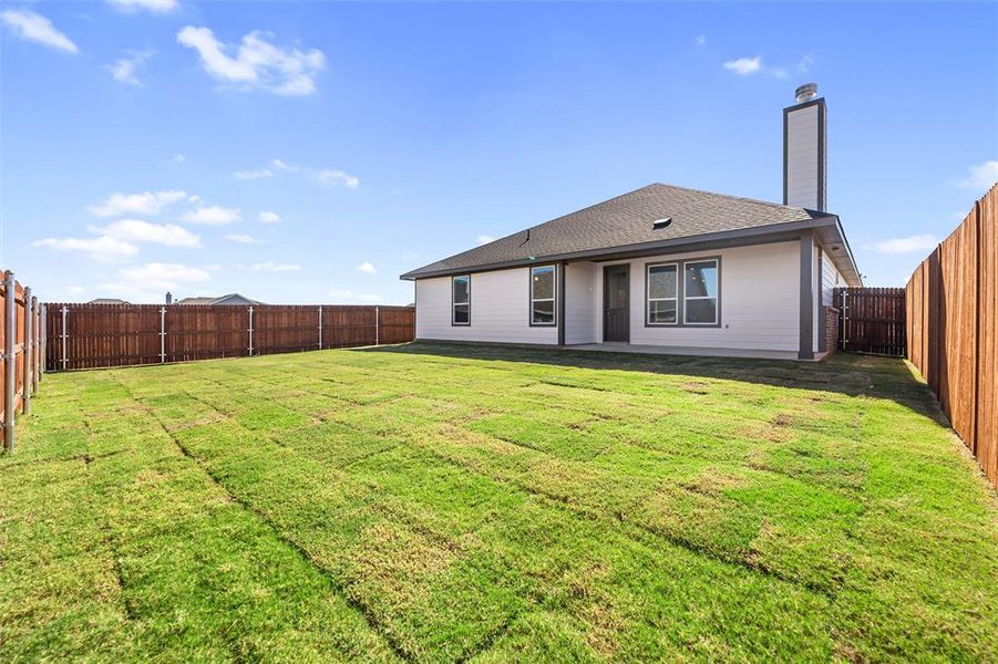 Exterior details and patio area of a home in Covenant Park, Springtown (Image 16). Exterior details and patio area of a home in Covenant Park, Springtown (Image 16).