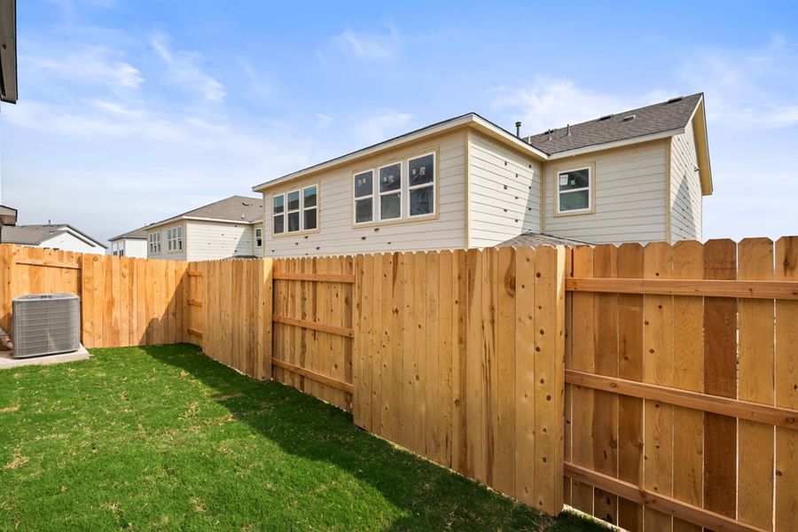 Exterior details and patio area of a home in Union Collection at Park Central, Georgetown (Image 29).