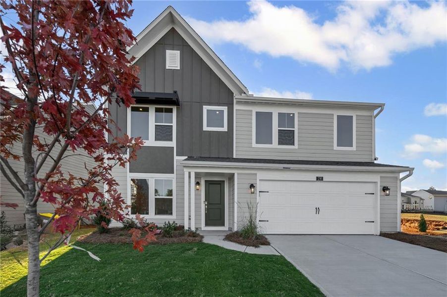 Front exterior of a new home in Twin Lakes, Hoschton, GA, highlighting curb appeal (Image 2). Front exterior of a new home in Twin Lakes, Hoschton, GA, highlighting curb appeal (Image 2).