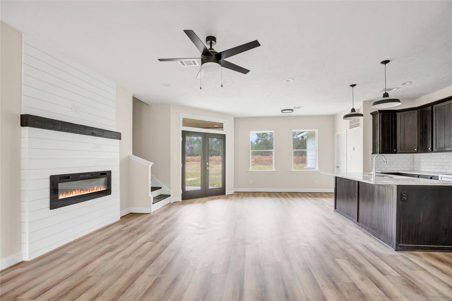 Heart of the home! Very modern and stylish. Electric fireplace sets the mood for date night!