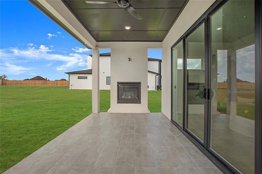 View of patio with ceiling fan