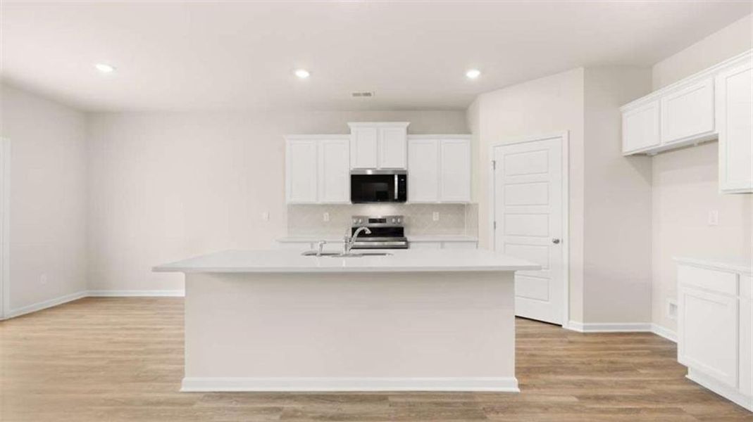 Furnished interior view inside a new home in The Preserve at Agricultural Village, Perry (Image 4). Furnished interior view inside a new home in The Preserve at Agricultural Village, Perry (Image 4).