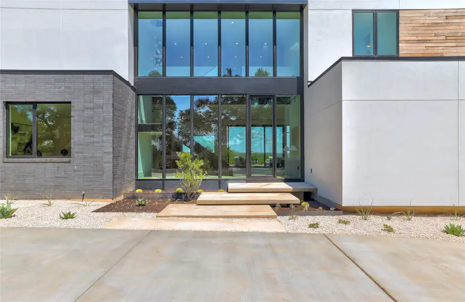 Front exterior of a new home in , Austin, TX, highlighting curb appeal (Image 2).