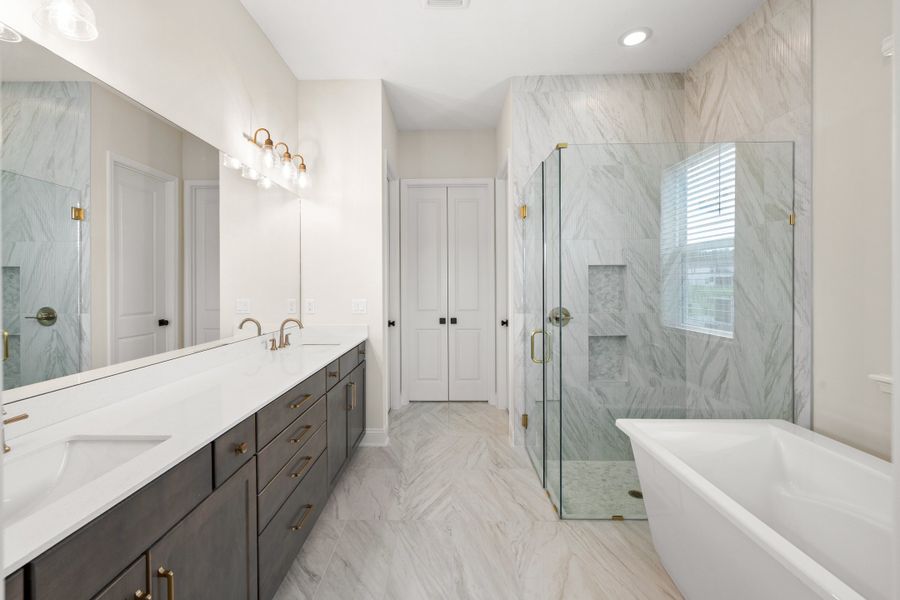 Representative furnished interior of a home built from the Aurora by Riverside Homes in Hidden Creek at SilverLeaf, St. Augustine (Image 18).