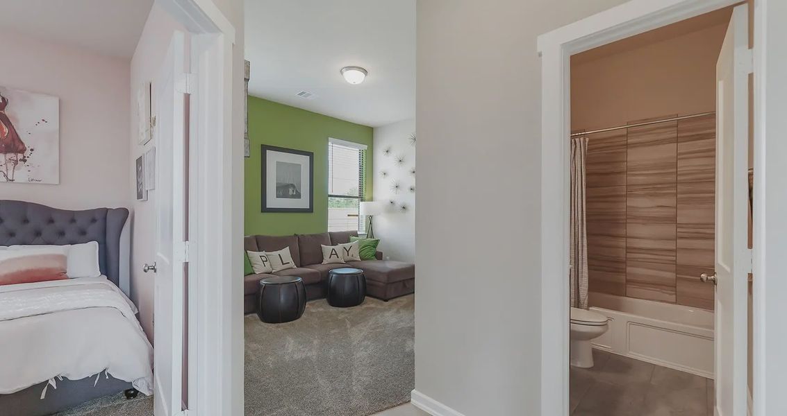 Representative furnished interior of a home built from the Orlando by Chesmar Homes in The Trails, New Caney (Image 11).
