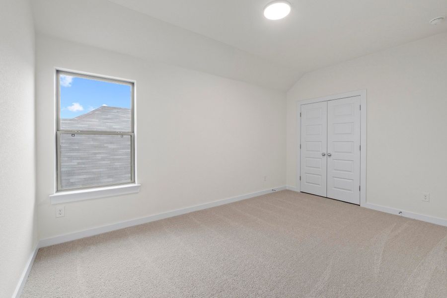 Bedroom in the Pearl home plan by Trophy Signature Homes – REPRESENTATIVE PHOTO Bedroom in the Pearl home plan by Trophy Signature Homes – REPRESENTATIVE PHOTO