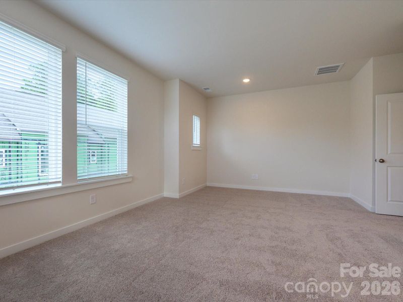 Spacious, unfurnished interior of a new home in Central Living at Craig, Charlotte (Image 26).