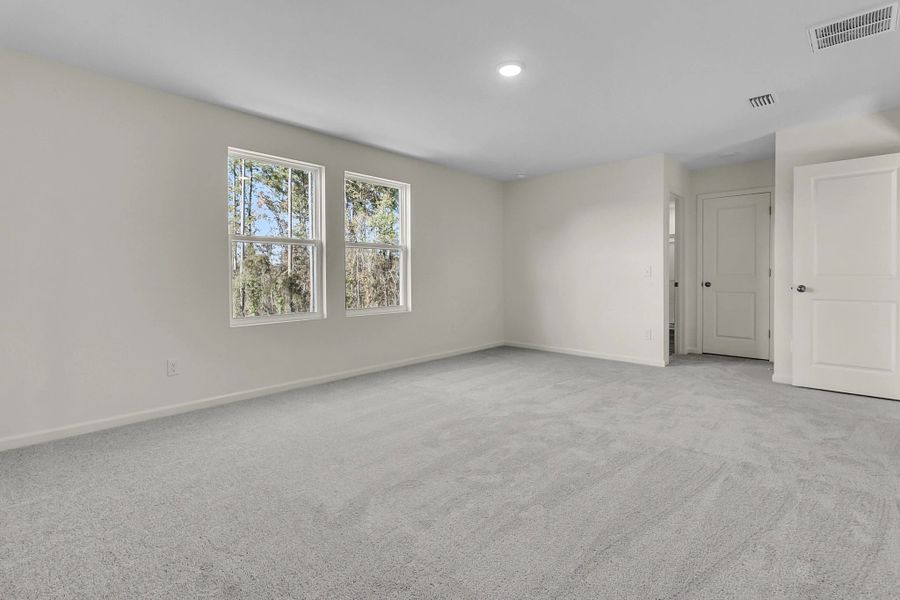 Representative unfurnished interior of a home built from the Supernova by Starlight Homes in Liberte, Converse (Image 22).