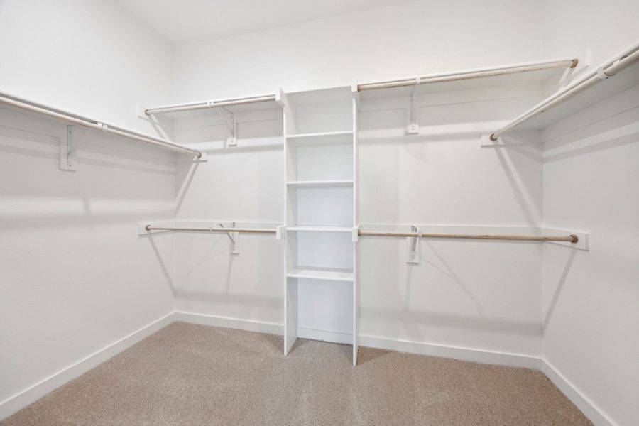 Primary Closet in the Mesquite home plan by Trophy Signature Homes – REPRESENTATIVE PHOTO Primary Closet in the Mesquite home plan by Trophy Signature Homes – REPRESENTATIVE PHOTO