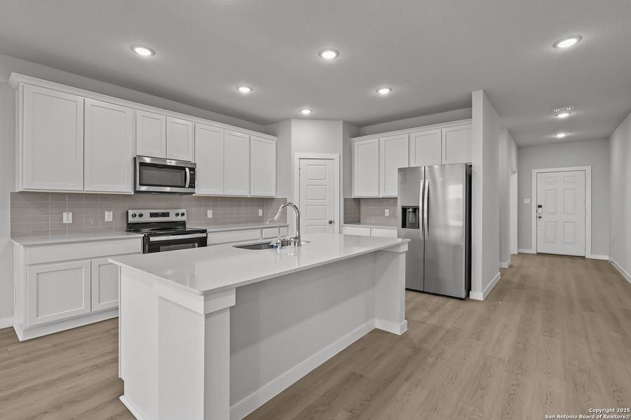 Furnished interior view inside a new home in Cinco Lakes, San Antonio (Image 7).