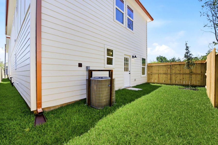 Exterior details and patio area of a home in , Houston (Image 4). Exterior details and patio area of a home in , Houston (Image 4).