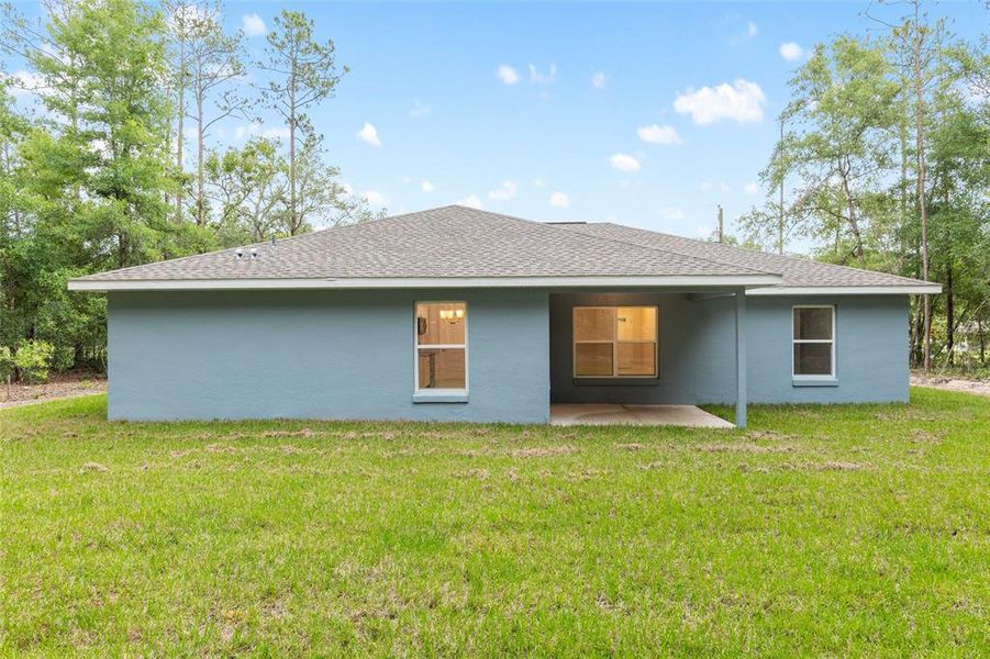 Front exterior of a new home in , Citrus Springs, FL, highlighting curb appeal (Image 15).