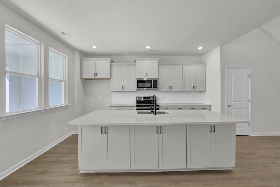 Furnished interior view inside a new home in Grand Park, Leland (Image 7).