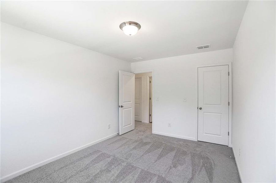 Spacious, unfurnished interior of a new home in The Pointe at Heron Bay, Locust Grove (Image 26).