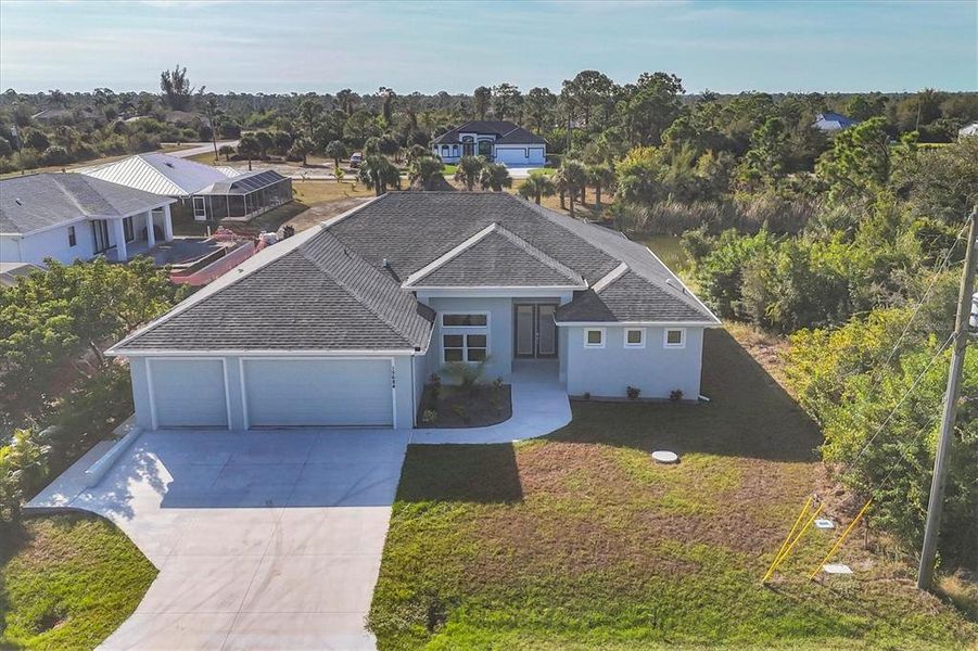 Front exterior of a new home in , Port Charlotte, FL, highlighting curb appeal (Image 1). Front exterior of a new home in , Port Charlotte, FL, highlighting curb appeal (Image 1).