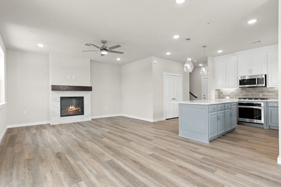 Spacious, unfurnished interior of a new home in The Tribute, The Colony (Image 20).