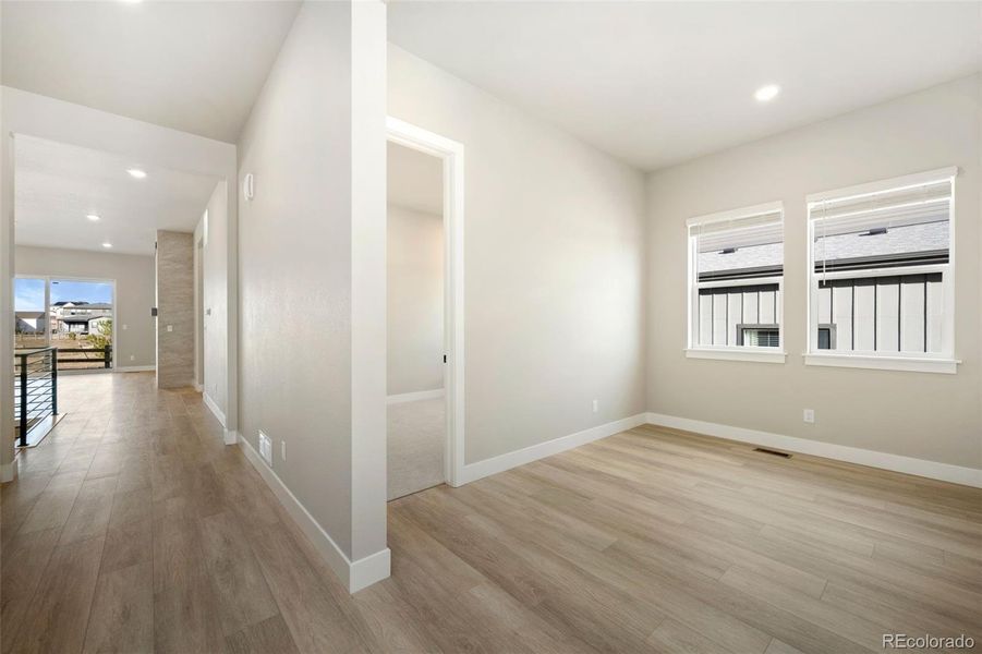 Spacious, unfurnished interior of a new home in Kitchel Lake at Serratoga Falls, Timnath (Image 14).