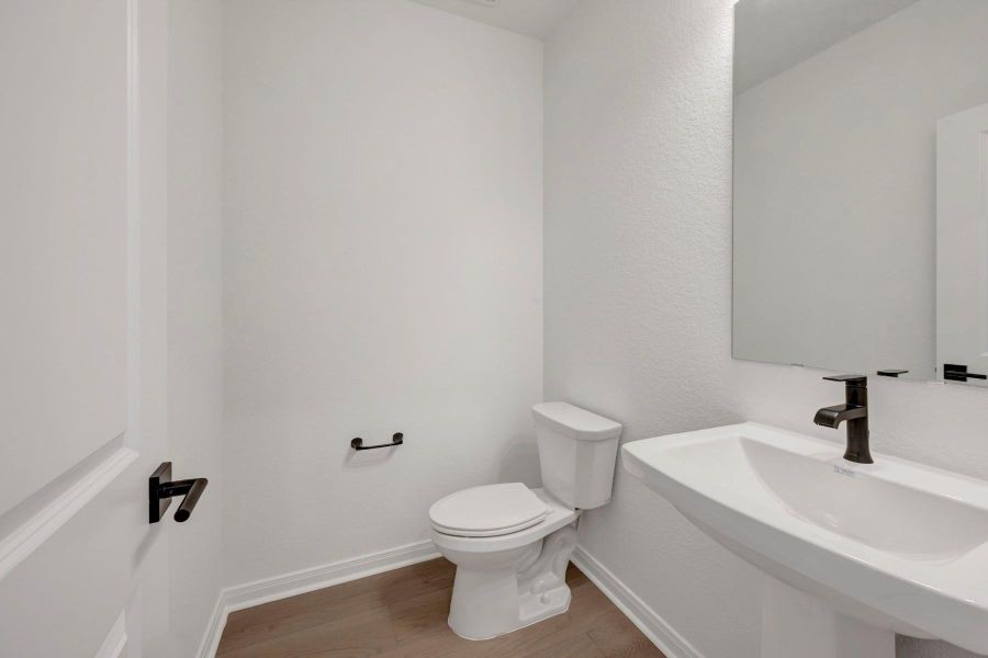 Furnished interior view inside a new home in Beacon Point at Lago Mar 50’ Homesites, Texas City (Image 9).