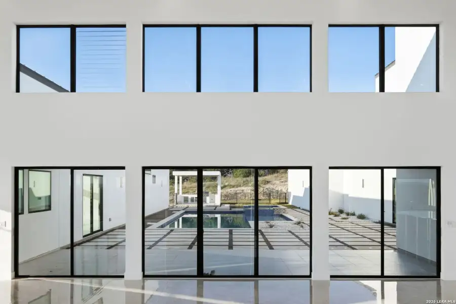 Exterior details and patio area of a home in , San Antonio (Image 38).