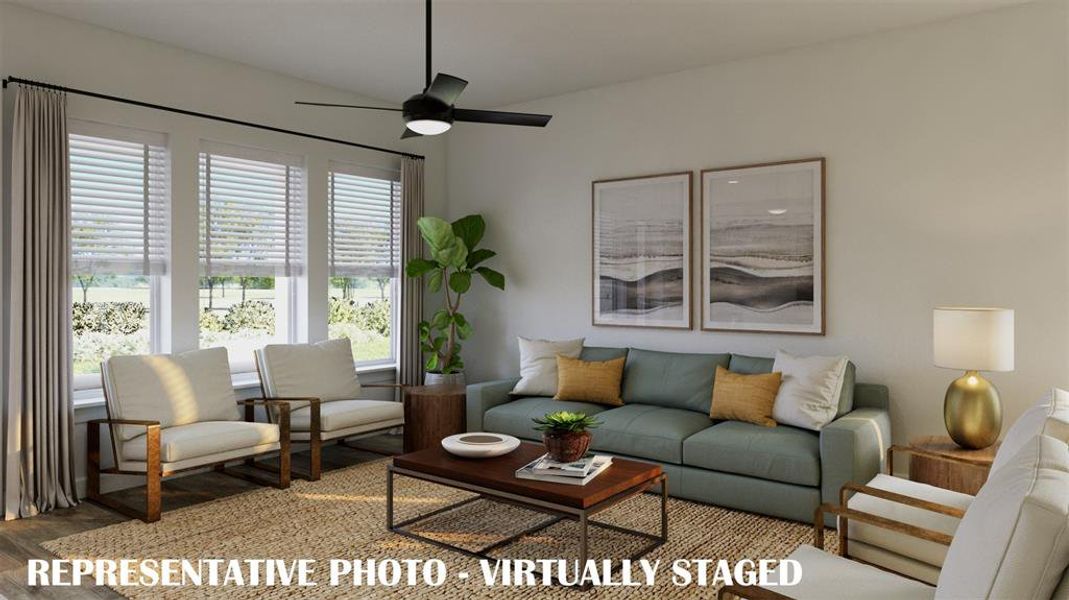 A family room filled with natural light and plenty of space to host the entire family!  VIRTUALLY STAGED RENDERING