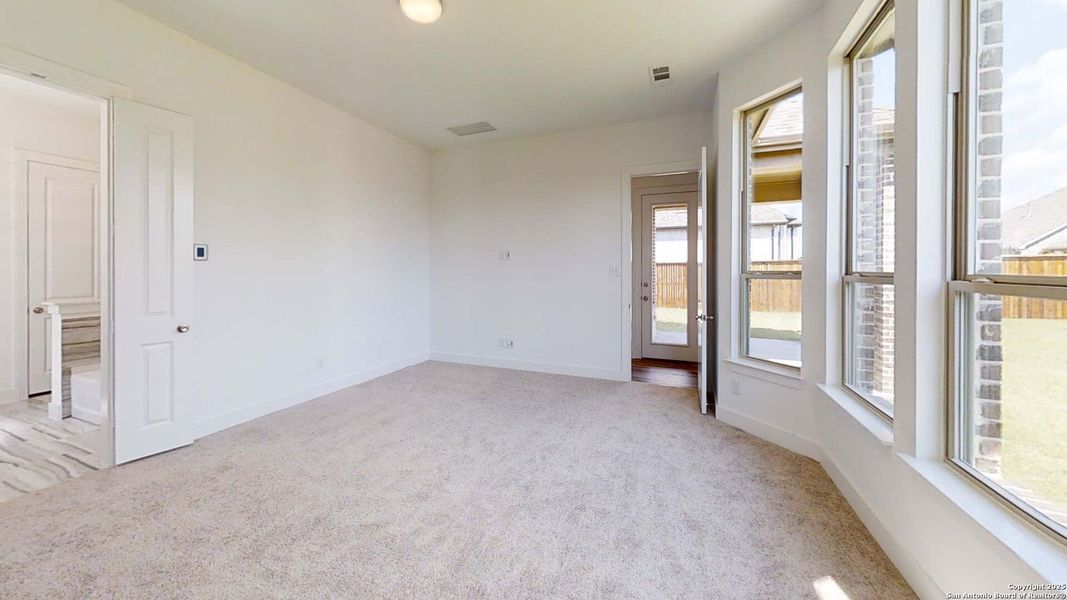 Spacious, unfurnished interior of a new home in Alsatian Oaks: 60ft. lots, Castroville (Image 19).