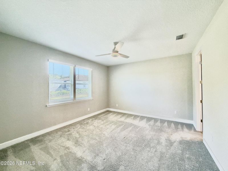 Spacious, unfurnished interior of a new home in Seasons at TrailMark, St. Augustine (Image 65).