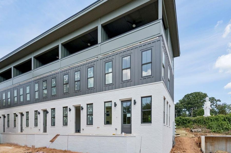 Front exterior of a new home in , Atlanta, GA, highlighting curb appeal (Image 1).