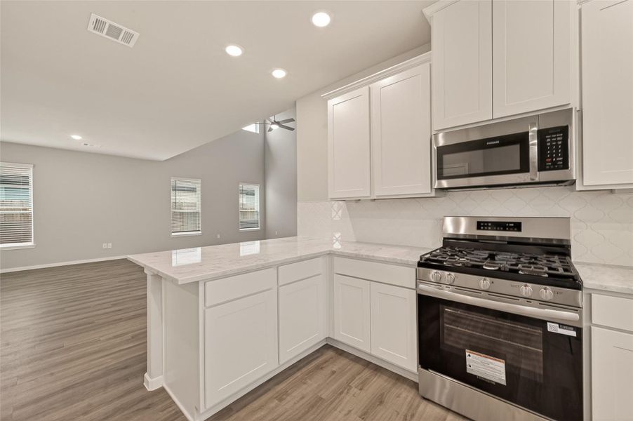 Furnished interior view inside a new home in Sunterra, Katy (Image 16).