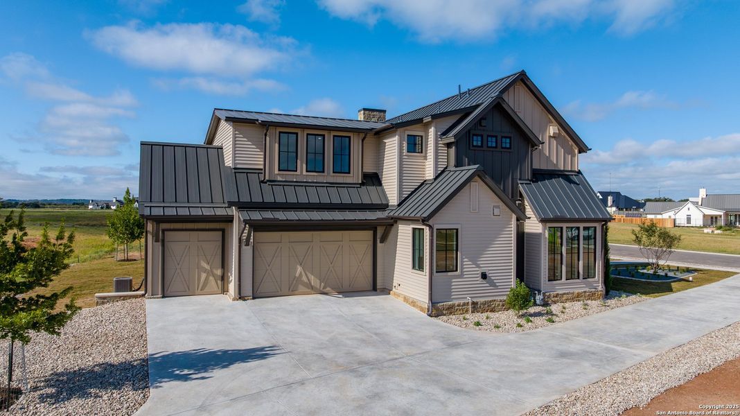 Front exterior of a new home in , Fredericksburg, TX, highlighting curb appeal (Image 26). Front exterior of a new home in , Fredericksburg, TX, highlighting curb appeal (Image 26).