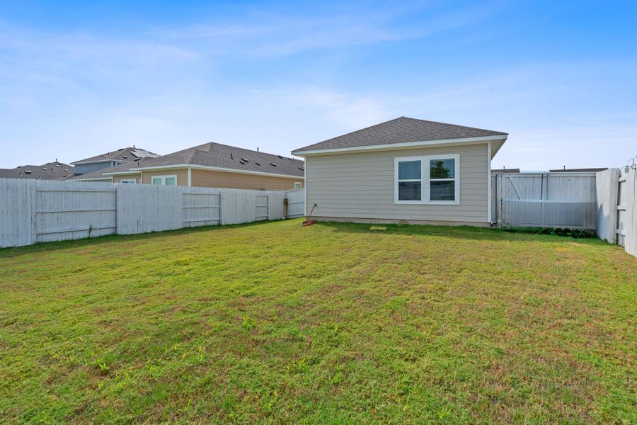 Front exterior of a new home in Harvest Ridge, Elgin, TX, highlighting curb appeal (Image 19).