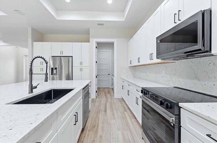 Furnished interior view inside a new home in , Port Charlotte (Image 10).
