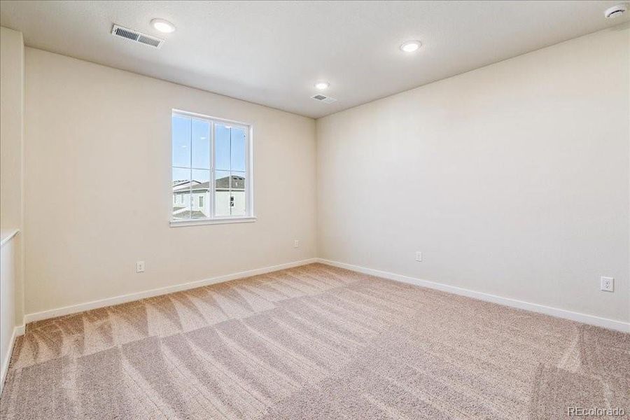 Spacious, unfurnished interior of a new home in Floret Collection at Alder Creek, Parker (Image 23).