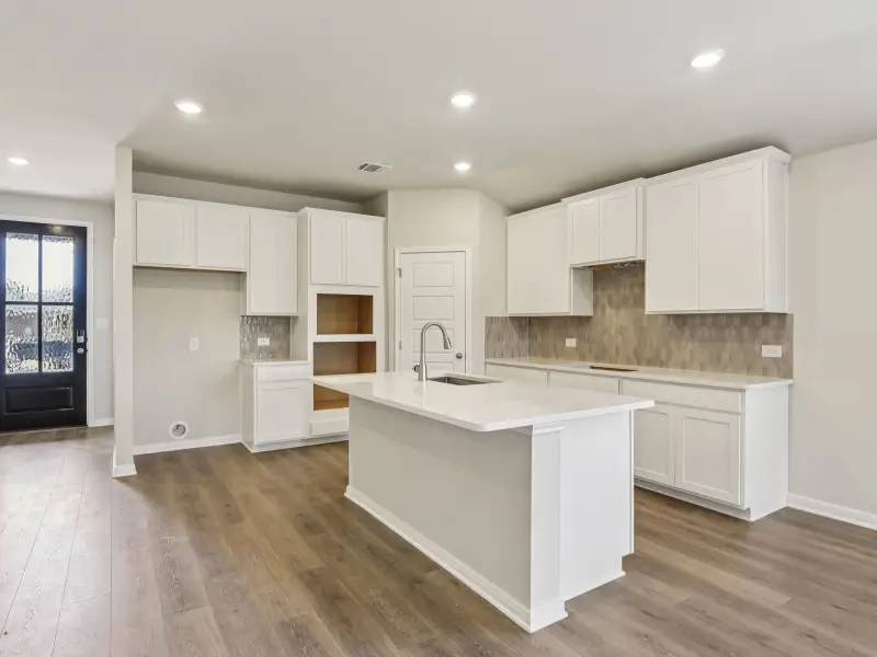 Kitchen in the Oleander floorplan at a Meritage Homes community.