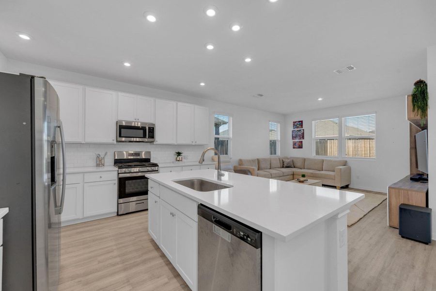 Furnished interior view inside a new home in Seasons at Carillon, Manor (Image 11).