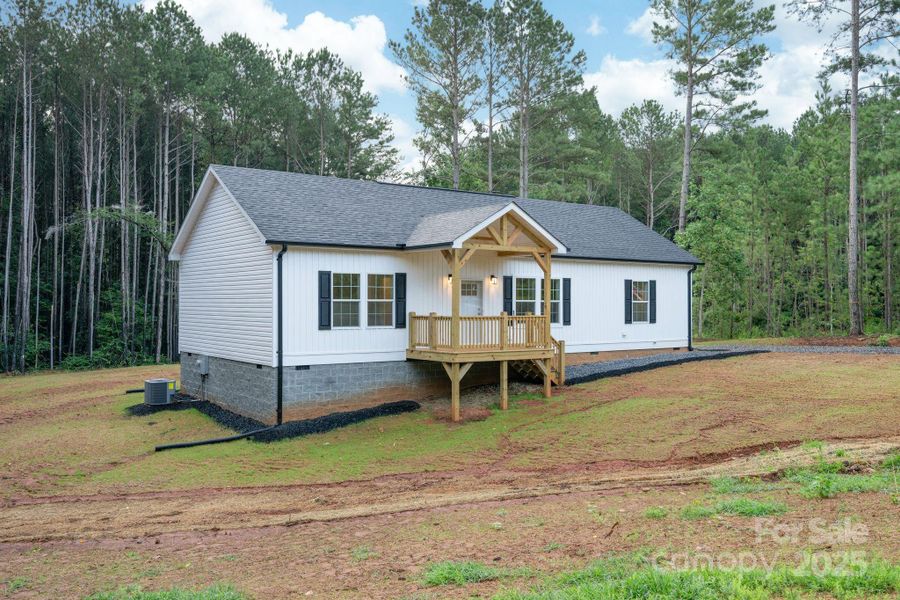 Front exterior of a new home in , Statesville, NC, highlighting curb appeal (Image 23).