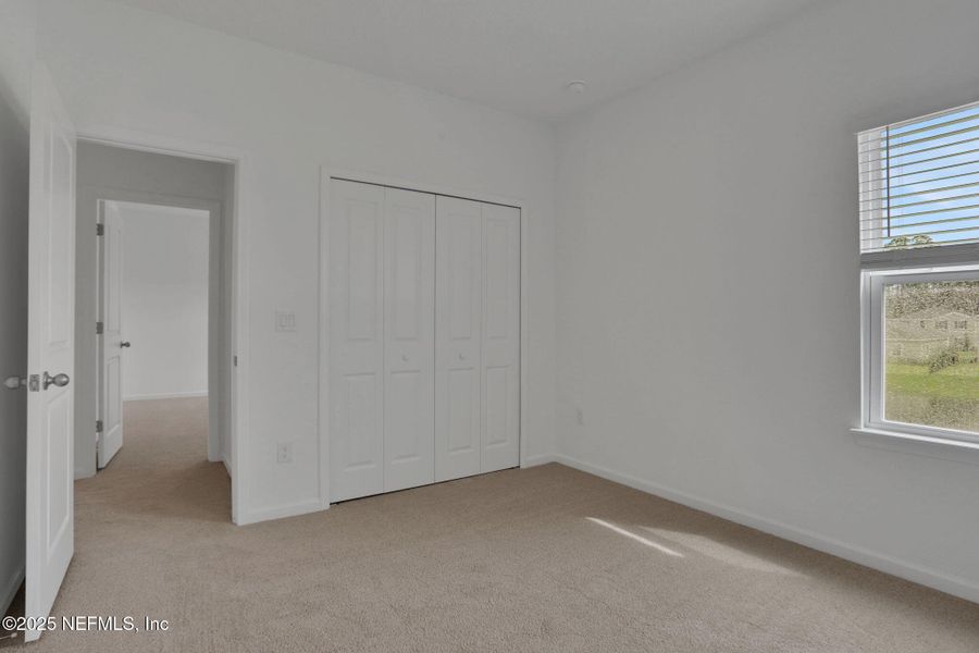 Spacious, unfurnished interior of a new home in TrailMark, St. Augustine (Image 17).