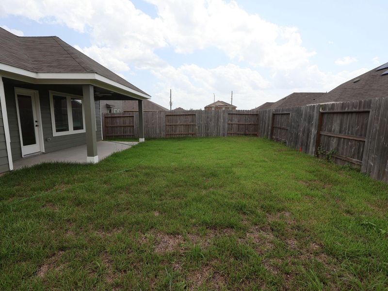 Exterior details and patio area of a home in Miller's Pond, Rosenberg (Image 23).