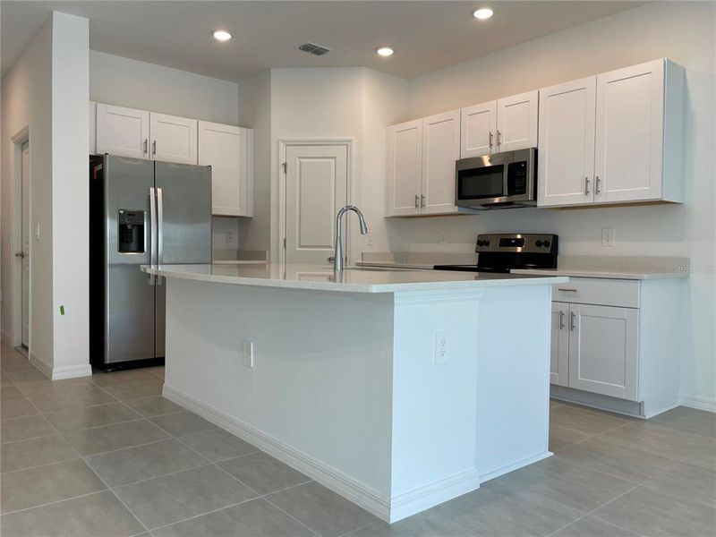 Furnished interior view inside a new home in Seasons at Big Sky, Kissimmee (Image 6).