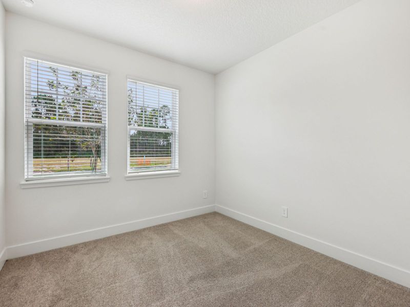 Spacious, unfurnished interior of a new home in Ridgehaven - Signature Series, Ormond Beach (Image 12).