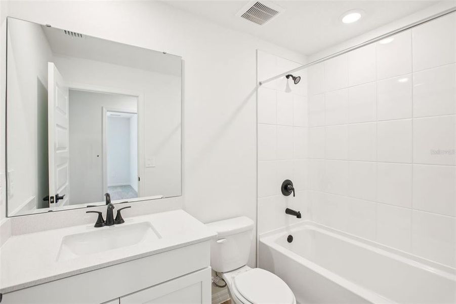 Furnished interior view inside a new home in Two Rivers - Signature Series, Zephyrhills (Image 11).