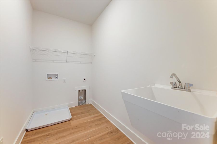 Large laundry room with sink!