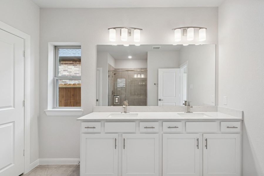 Furnished interior view inside a new home in Beacon Point at Lago Mar 50’ Homesites, Texas City (Image 11).