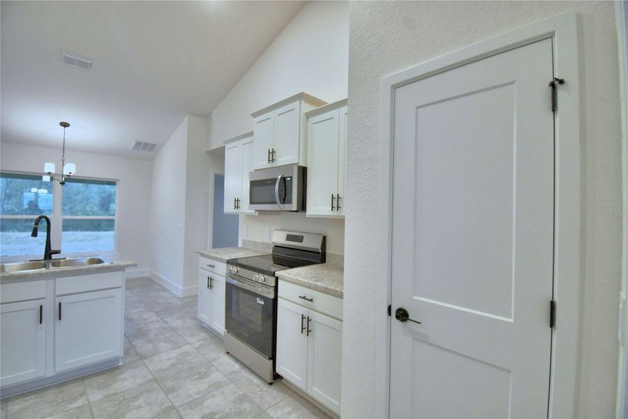 Furnished interior view inside a new home in Cadence Crossing, Auburndale (Image 8).