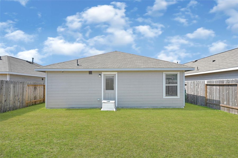 Exterior details and patio area of a home in Townsend Reserve: Cottage Collection, Splendora (Image 18). Exterior details and patio area of a home in Townsend Reserve: Cottage Collection, Splendora (Image 18).