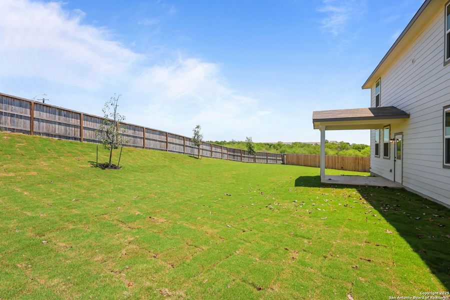 Front exterior of a new home in Comanche Ridge, San Antonio, TX, highlighting curb appeal (Image 51). Front exterior of a new home in Comanche Ridge, San Antonio, TX, highlighting curb appeal (Image 51).