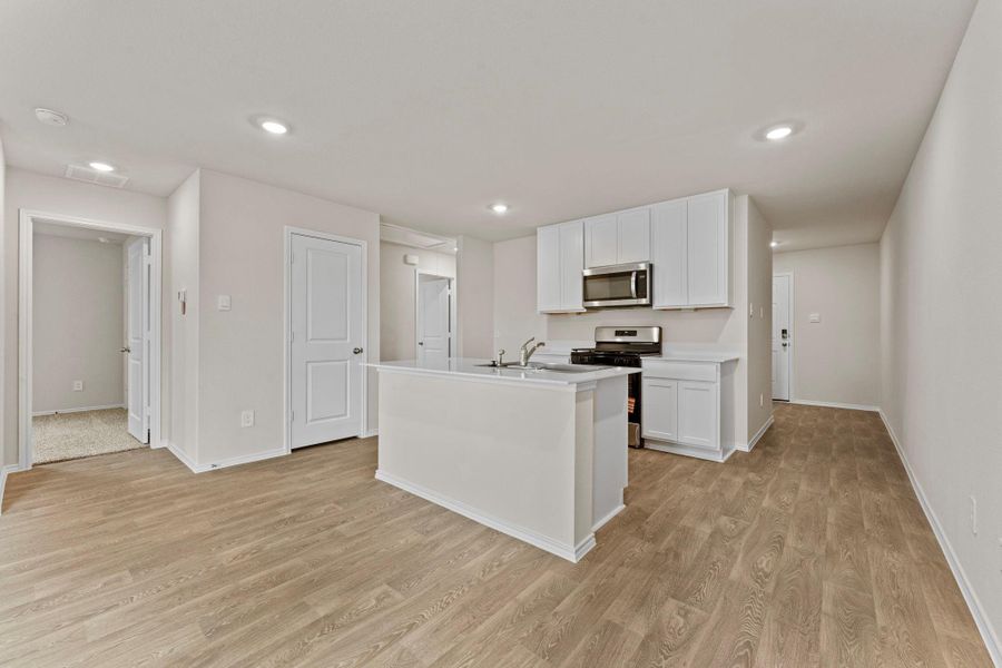 Furnished interior view inside a new home in Bollinger, Uhland (Image 7).