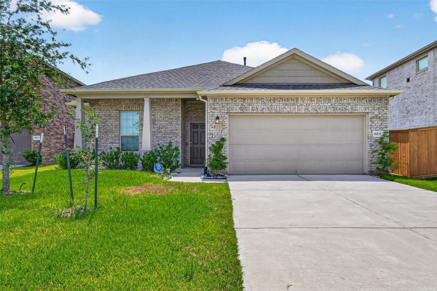 Front exterior of a new home in Marvida, Cypress, TX, highlighting curb appeal (Image 28).