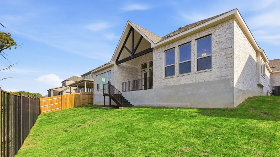 Exterior details and patio area of a home in Oaks at San Gabriel, Georgetown (Image 3).