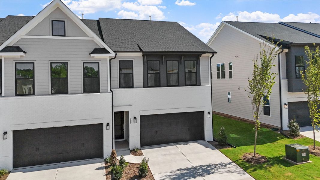 Front exterior of a new home in Sweetbrier, Durham, NC, highlighting curb appeal (Image 21).